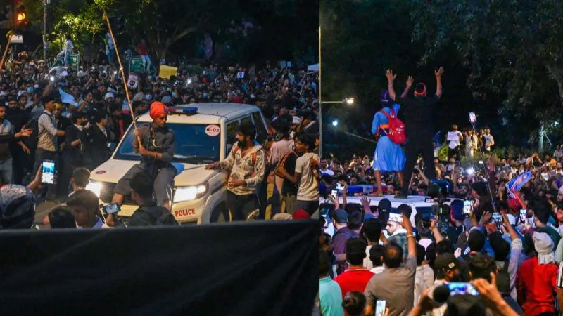 सिर पर पगड़ी, हाथ में लाठी, मुंह पर नकाब...संसद मार्ग के पास बैरिकेड्स पर चढ़े प्रदर्शनकारी, पुलिस पर भी पत्थरबाजी